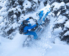 Snowmobile riding. Click this image to Shop for Snowmobile AMSOIL Lubrication